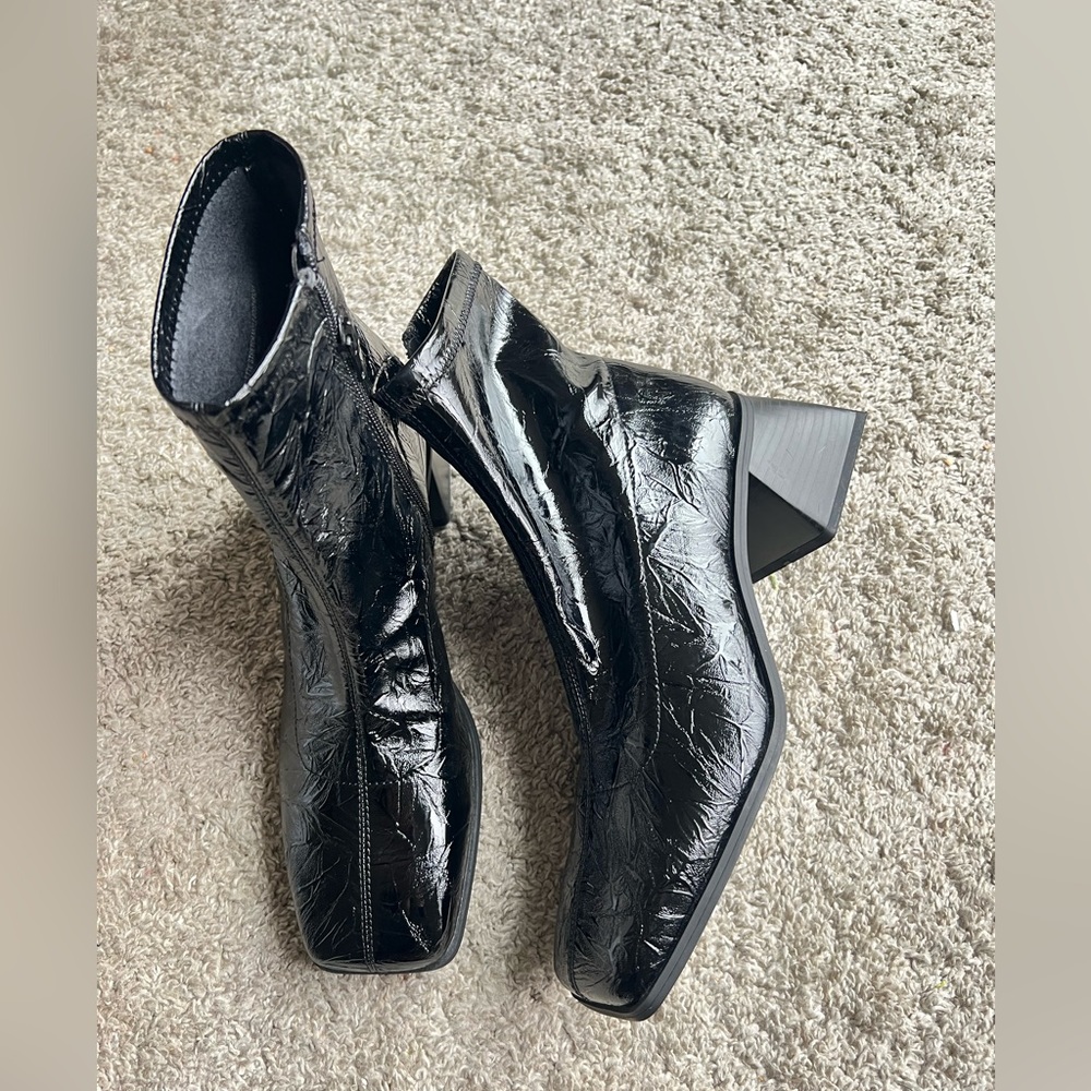 Katy Perry. New without tags. Size 9. Glossy Black Heeled Boots